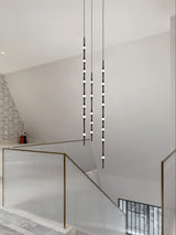 dew-explores-modern-linear-led-pendant-light-with-organic-oval-points-for-stairwells