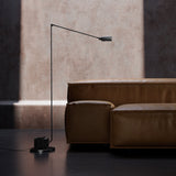 Dynamo Adjustable Arm LED Floor Lamp with Rotating Metal Diffuser and Cylindrical Base Standing Light