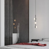 modern-metal-and-glass-globe-pendant-light-for-dining-room-in-gold-and-black-finish