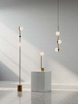 modern-metal-and-glass-globe-pendant-light-for-dining-room-in-gold-and-black-finish