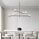 modern-metal-and-glass-globe-pendant-light-for-dining-room-in-gold-and-black-finish