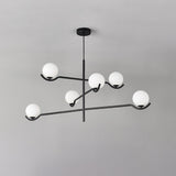 modern-metal-and-glass-globe-pendant-light-for-dining-room-in-gold-and-black-finish