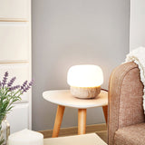 Modern Yellow Travertine Stone Table Lamp with Glass Globe for Minimalist Bedside Decor