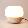 Modern Yellow Travertine Stone Table Lamp with Glass Globe for Minimalist Bedside Decor