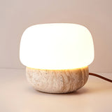 Modern Yellow Travertine Stone Table Lamp with Glass Globe for Minimalist Bedside Decor