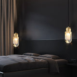 modern-oval-droplet-crystal-pendant-light-with-gold-brass-finish-for-luxury-dining-and-bedroom