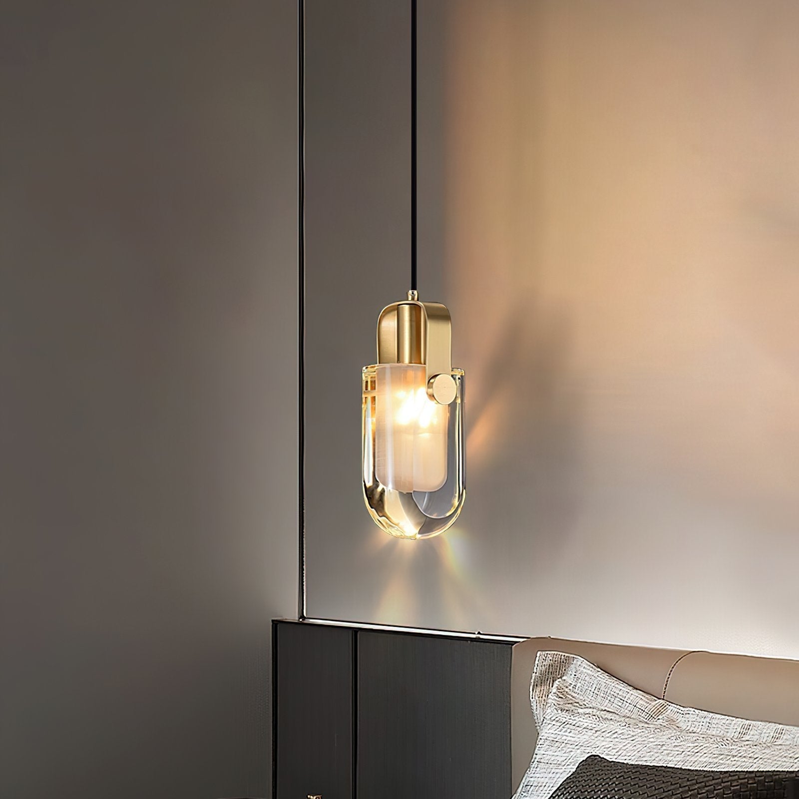 modern-oval-droplet-crystal-pendant-light-with-gold-brass-finish-for-luxury-dining-and-bedroom