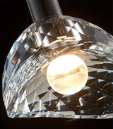 modern-crystal-hanging-pendant-light-with-brass-accents-and-matte-black-finish