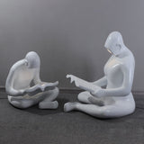 artistic-figurine-resin-floor-light-for-contemporary-interiors-and-reading-spaces