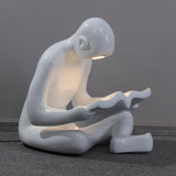 artistic-figurine-resin-floor-light-for-contemporary-interiors-and-reading-spaces