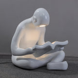 artistic-figurine-resin-floor-light-for-contemporary-interiors-and-reading-spaces