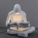 artistic-figurine-resin-floor-light-for-contemporary-interiors-and-reading-spaces