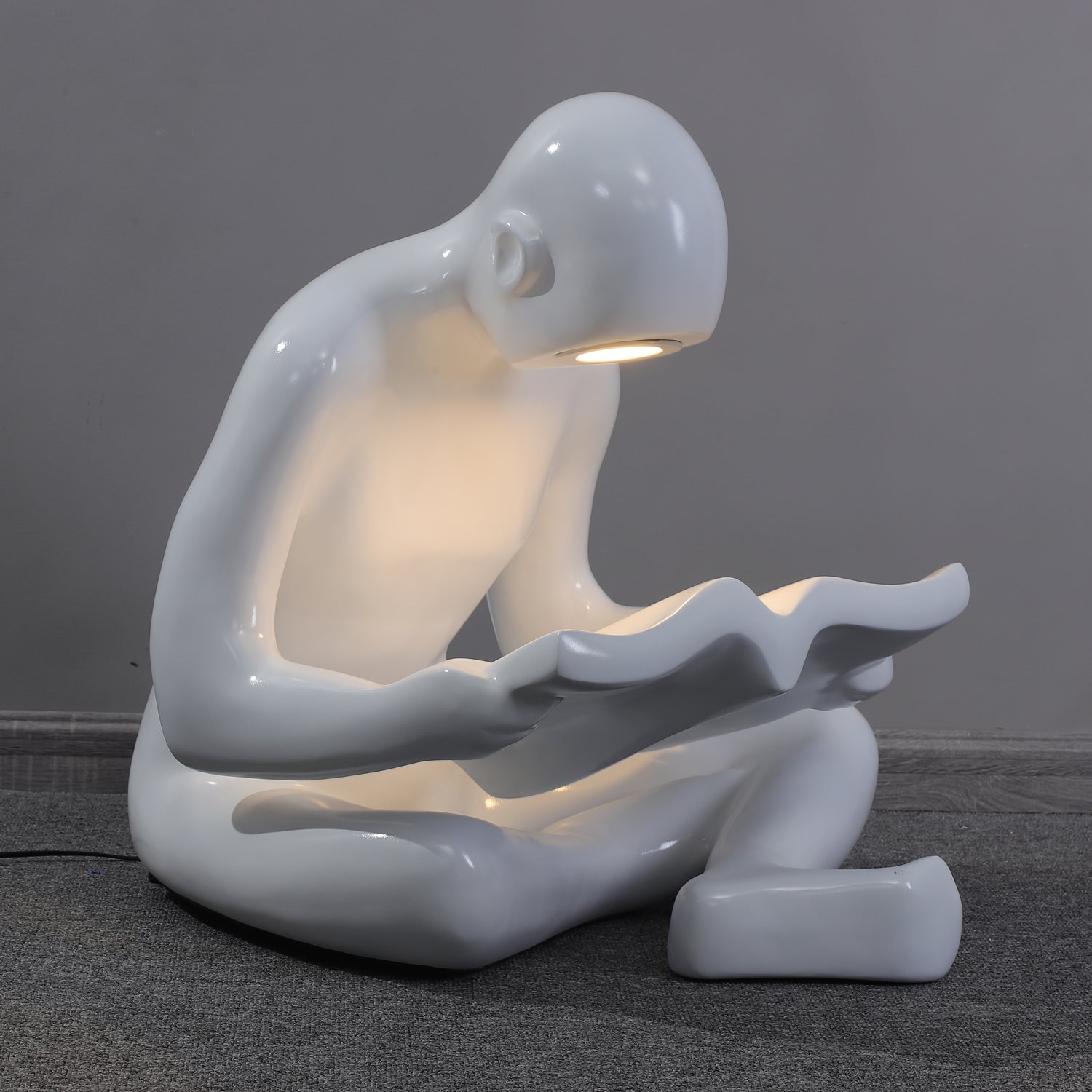 artistic-figurine-resin-floor-light-for-contemporary-interiors-and-reading-spaces