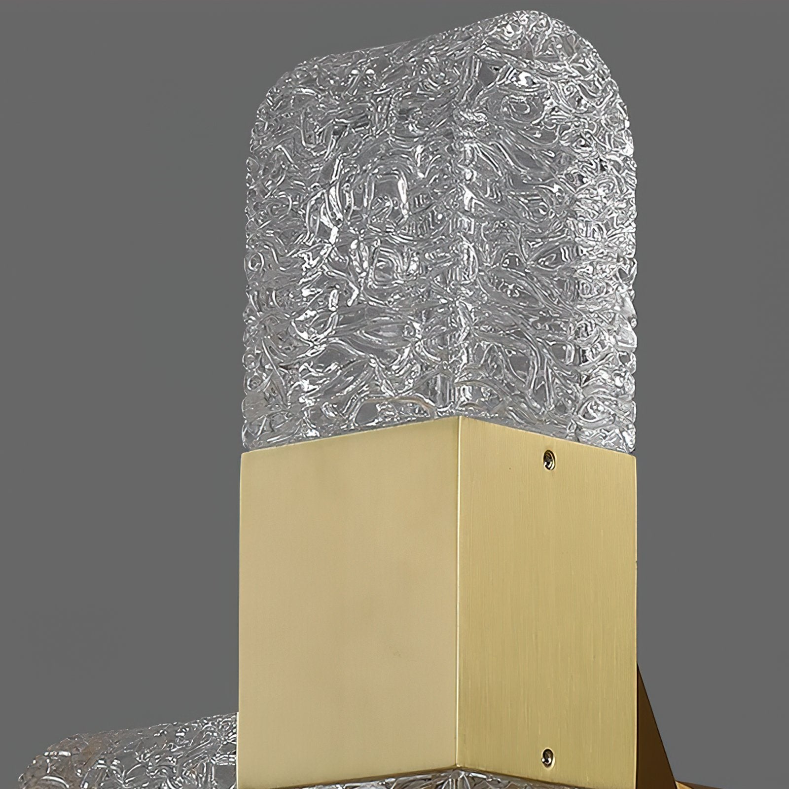 modern-luxury-oval-glass-wall-sconce-with-textured-ice-glass-and-brass-finish-integrated-led-lighting