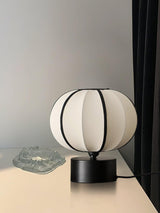 Contemporary Minimalist Table Lamp with Beige Fabric Shade and Black Metal Base