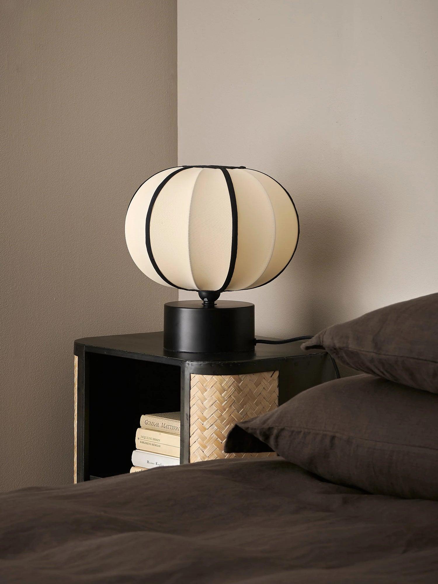 Contemporary Minimalist Table Lamp with Beige Fabric Shade and Black Metal Base