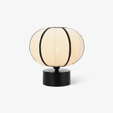 Contemporary Minimalist Table Lamp with Beige Fabric Shade and Black Metal Base
