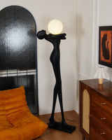 Modern Artistic Figure Floor Lamp with White Glass Globe Sculpture Standing Light