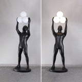Artistic Humanoid Figure Standing Lamp with Triple Glass Spheres for Modern Living Room