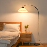 modern-arched-floor-lamp-with-pleated-white-shade-and-matte-black-metal-frame