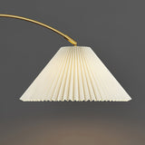 modern-arched-floor-lamp-with-pleated-white-shade-and-matte-black-metal-frame