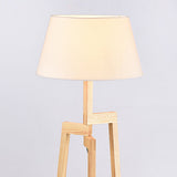 modern-ash-wood-tripod-floor-lamp-with-white-fabric-shade-for-living-room-and-bedroom