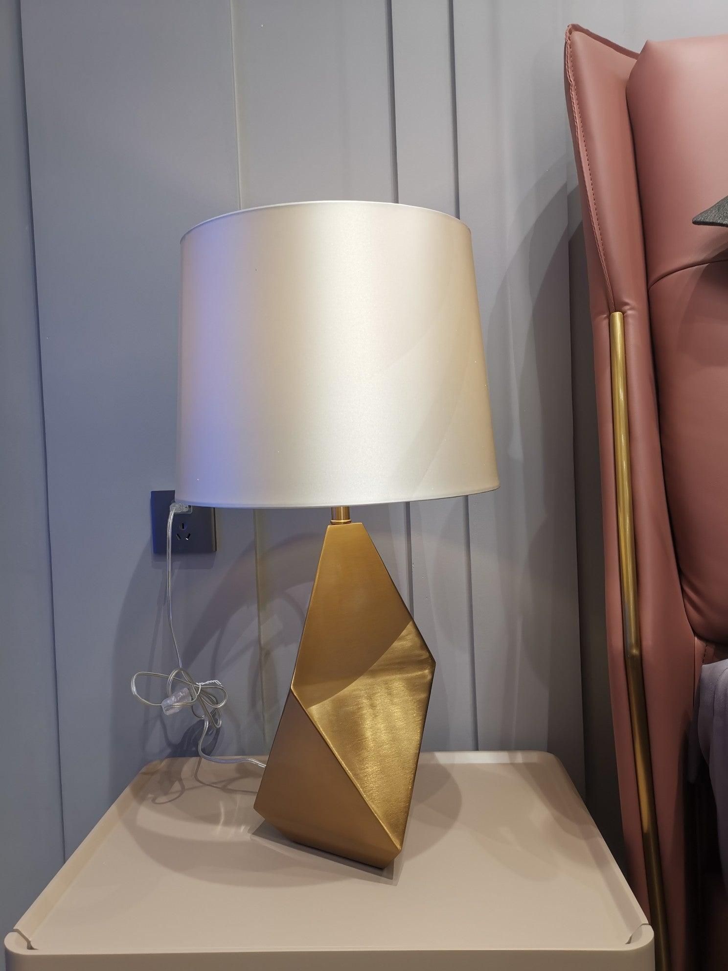 modern-gold-asymmetrical-faceted-table-lamp-with-polyhedral-metal-base-and-fabric-shade