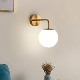 elegant-brass-fishing-wall-light-with-white-glass-globe-shade-for-indoor-decor