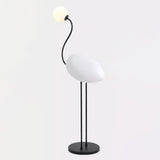 Elegant Flamingo Sculpture Standing Light with Frosted Glass Shade for Modern Interiors