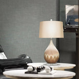 elegant-ceramic-table-lamp-with-ivory-linen-shade-and-metallic-rust-beige-finish