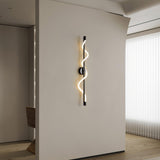 modern-spiral-led-wall-sconce-with-flexible-silicone-curve-and-brass-accents