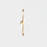modern-spiral-led-wall-sconce-with-flexible-silicone-curve-and-brass-accents