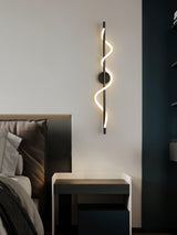 modern-spiral-led-wall-sconce-with-flexible-silicone-curve-and-brass-accents