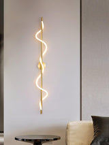 modern-spiral-led-wall-sconce-with-flexible-silicone-curve-and-brass-accents