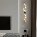 modern-spiral-led-wall-sconce-with-flexible-silicone-curve-and-brass-accents