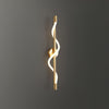 modern-spiral-led-wall-sconce-with-flexible-silicone-curve-and-brass-accents