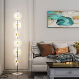 Floating Raindrop LED Floor Lamp Gold Finish and White Marble Pedestal