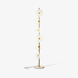 Floating Raindrop LED Floor Lamp Gold Finish and White Marble Pedestal