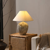 modern-bulbous-ceramic-table-lamp-with-pleated-fluted-texture-and-fabric-shade
