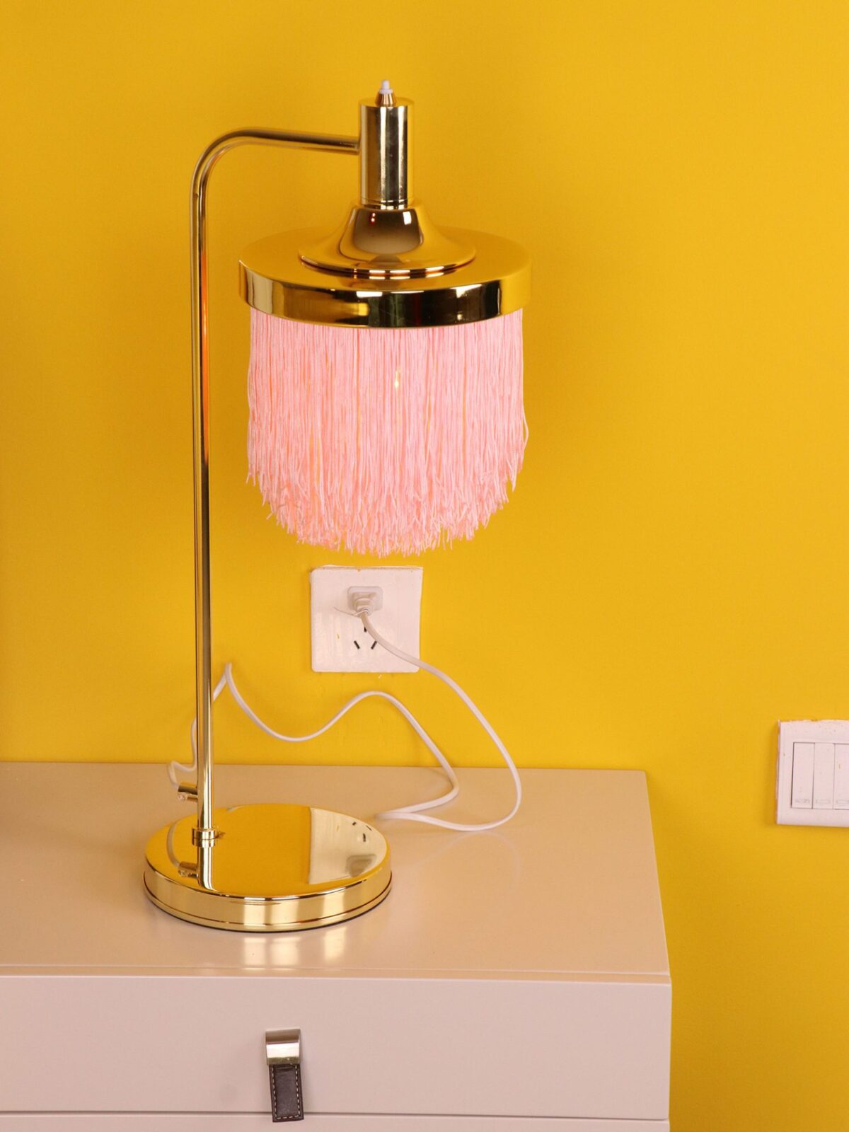 modern-nordic-tassel-fringe-table-lamp-with-pink-skirt-and-copper-metal-base