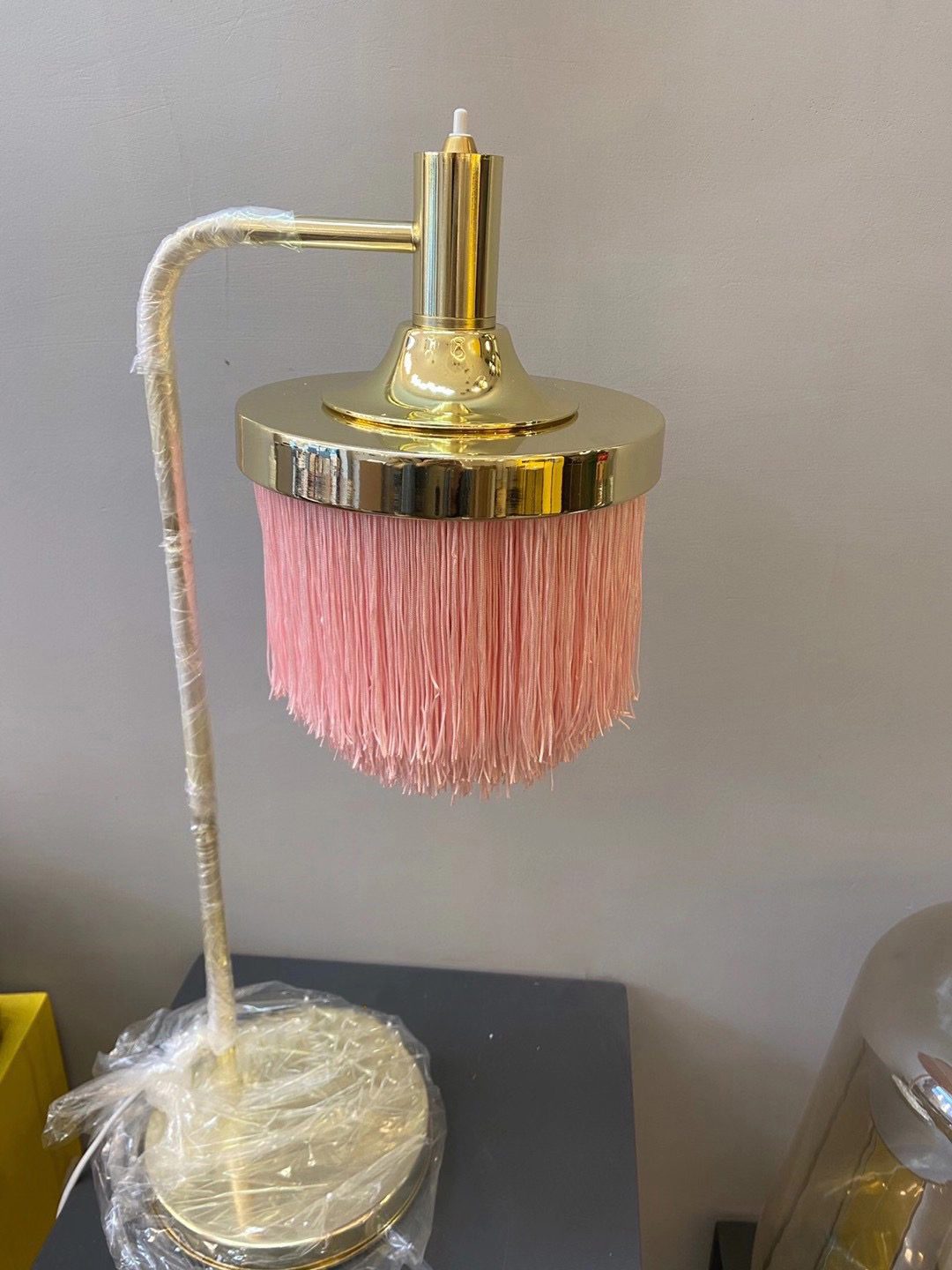 modern-nordic-tassel-fringe-table-lamp-with-pink-skirt-and-copper-metal-base