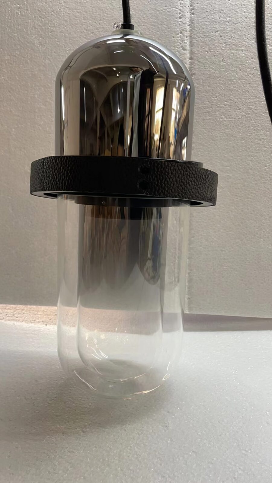 modern-abstract-led-pendant-light-with-glass-and-leather-details-for-living-room