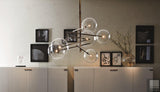 modern-glass-bubble-chandelier-with-burnished-brass-finish-and-led-integrated-lighting