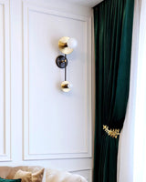 modern-geometric-composition-wall-sconce-with-gold-and-black-finish-white-glass-shade