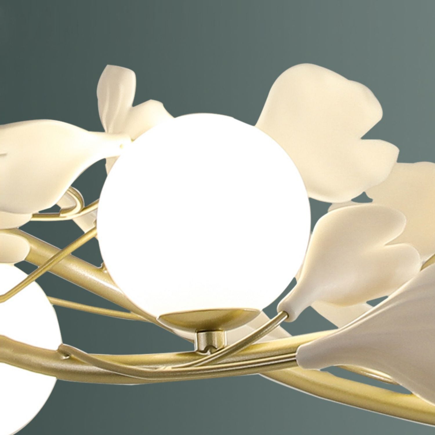 luxury-ginkgo-leaf-linear-chandelier-gold-metal-bar-light-with-white-ceramic-petal-shades
