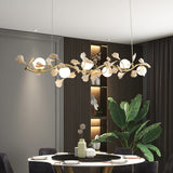 luxury-ginkgo-leaf-linear-chandelier-gold-metal-bar-light-with-white-ceramic-petal-shades