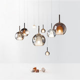 Glo Modern Glass Globe Pendant Light with Metallic Finish for Interior Lighting
