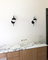 elegant-opaque-glass-globe-wall-sconce-with-brass-finish-modern-indoor-lighting-for-bedrooms-and-living-rooms