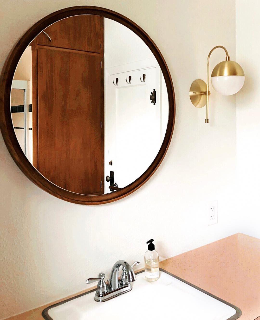 elegant-opaque-glass-globe-wall-sconce-with-brass-finish-modern-indoor-lighting-for-bedrooms-and-living-rooms