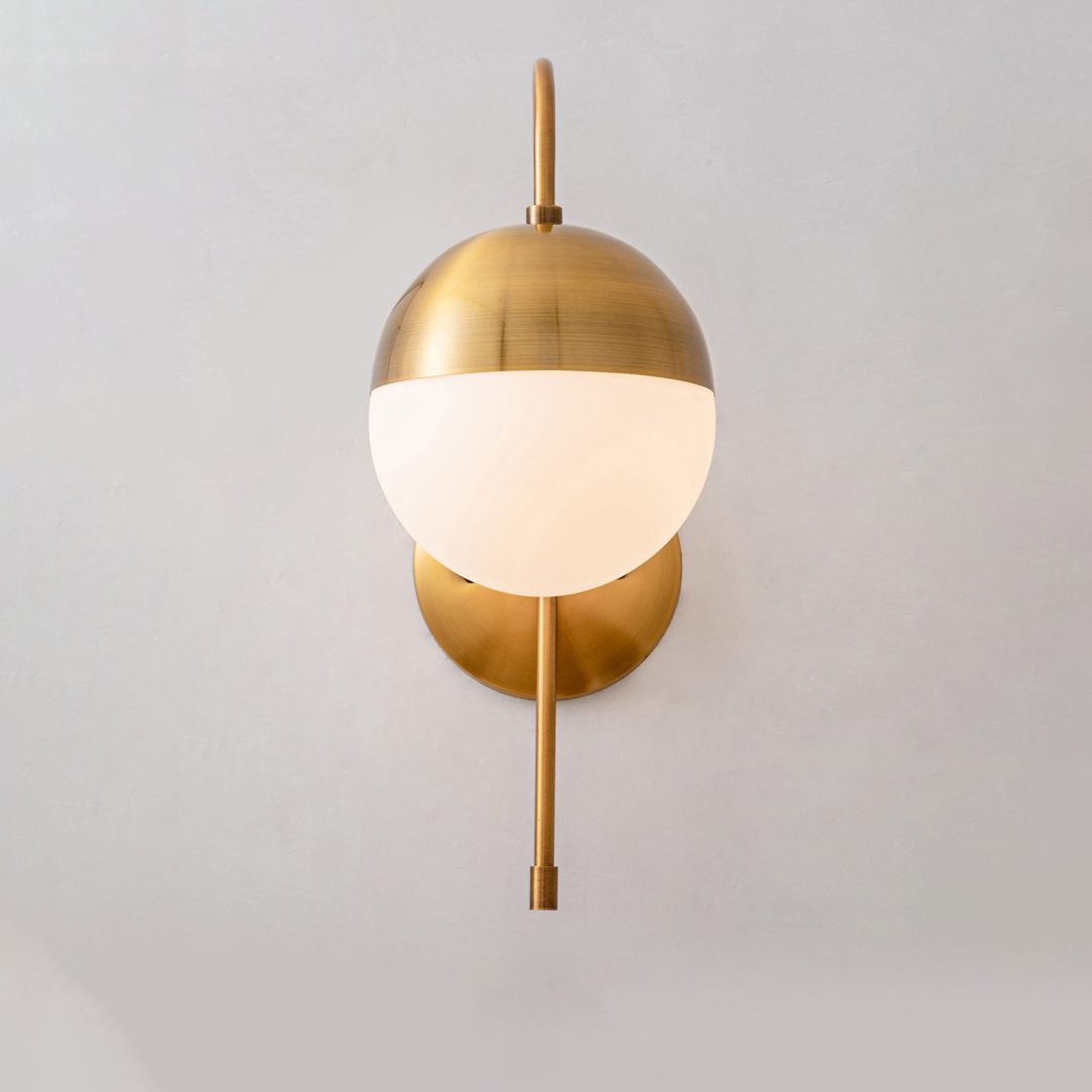 elegant-opaque-glass-globe-wall-sconce-with-brass-finish-modern-indoor-lighting-for-bedrooms-and-living-rooms